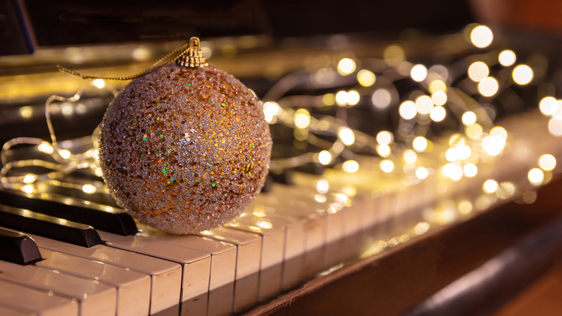 christmas-piano-music-xmas-lights-bokeh-background (1).jpg